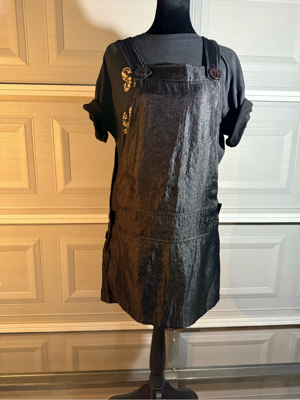 Black overalls style dress with open side/straps just like a regular overalls